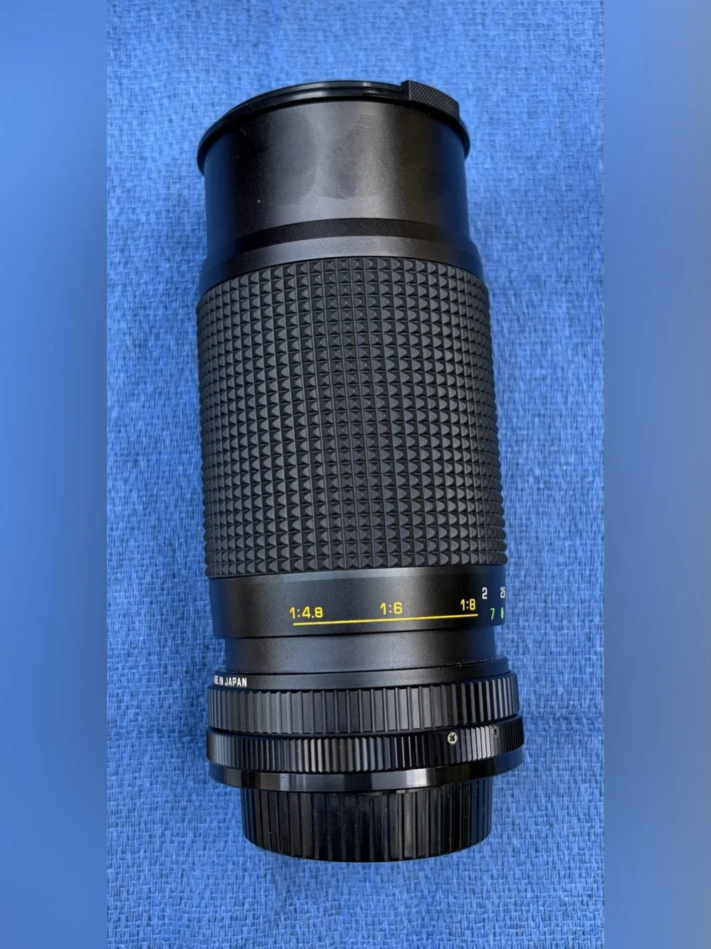 Excellent. Rokinon Auto Zoom Super Coated f/4.5 80-200mm Lens. Canon FD.